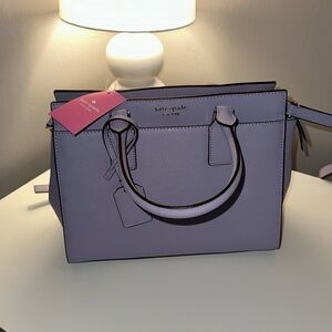 Lavender small Kate Spade purse brand new with tags